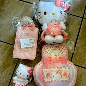 Very beautiful bundle of (4)  hello Kitty diamond collection